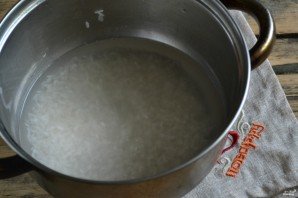 Каша рисовая молочная - фото шаг 2